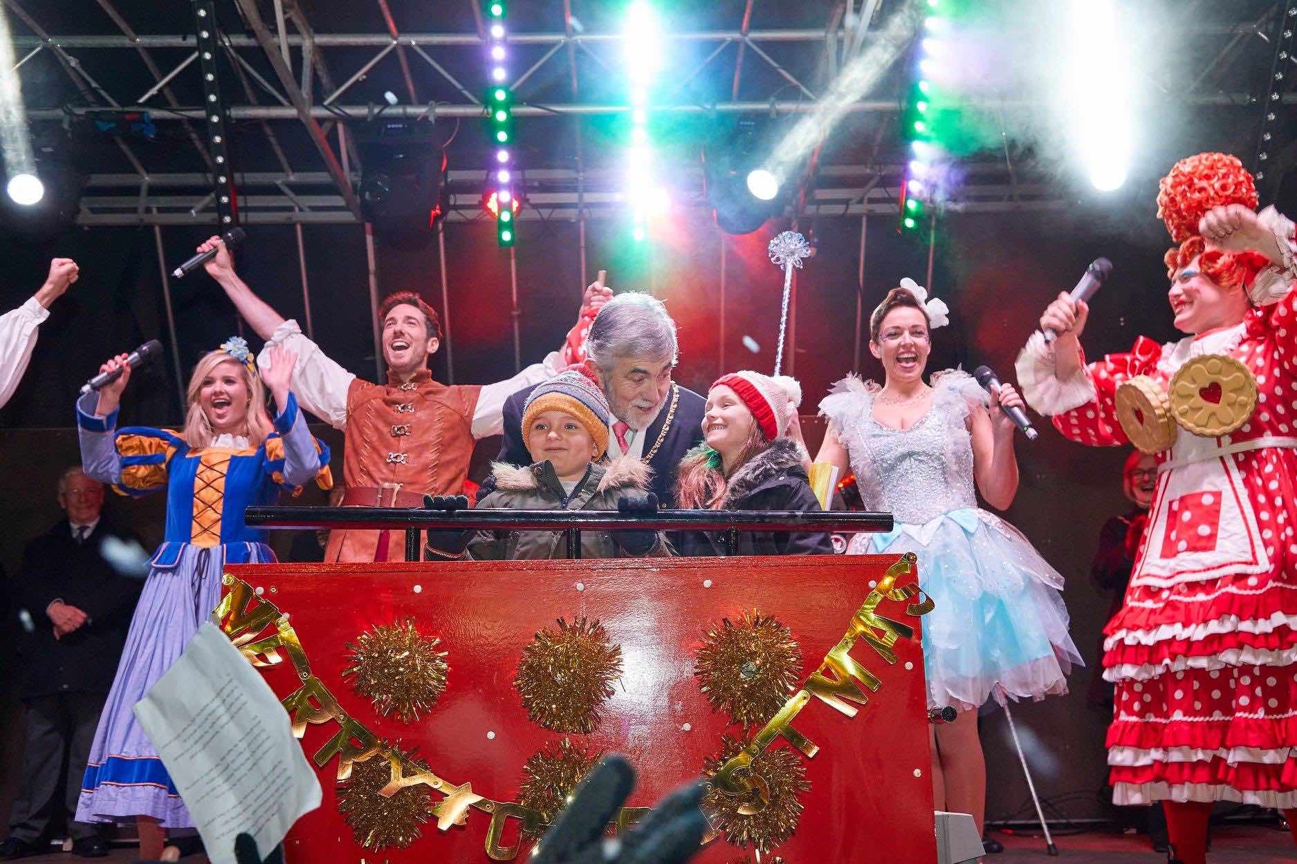 Lichfield , Staffordshire , Christmas , lights , switch on , 2018 , 2019 , gold , production , stage , hire , rent , rental , 