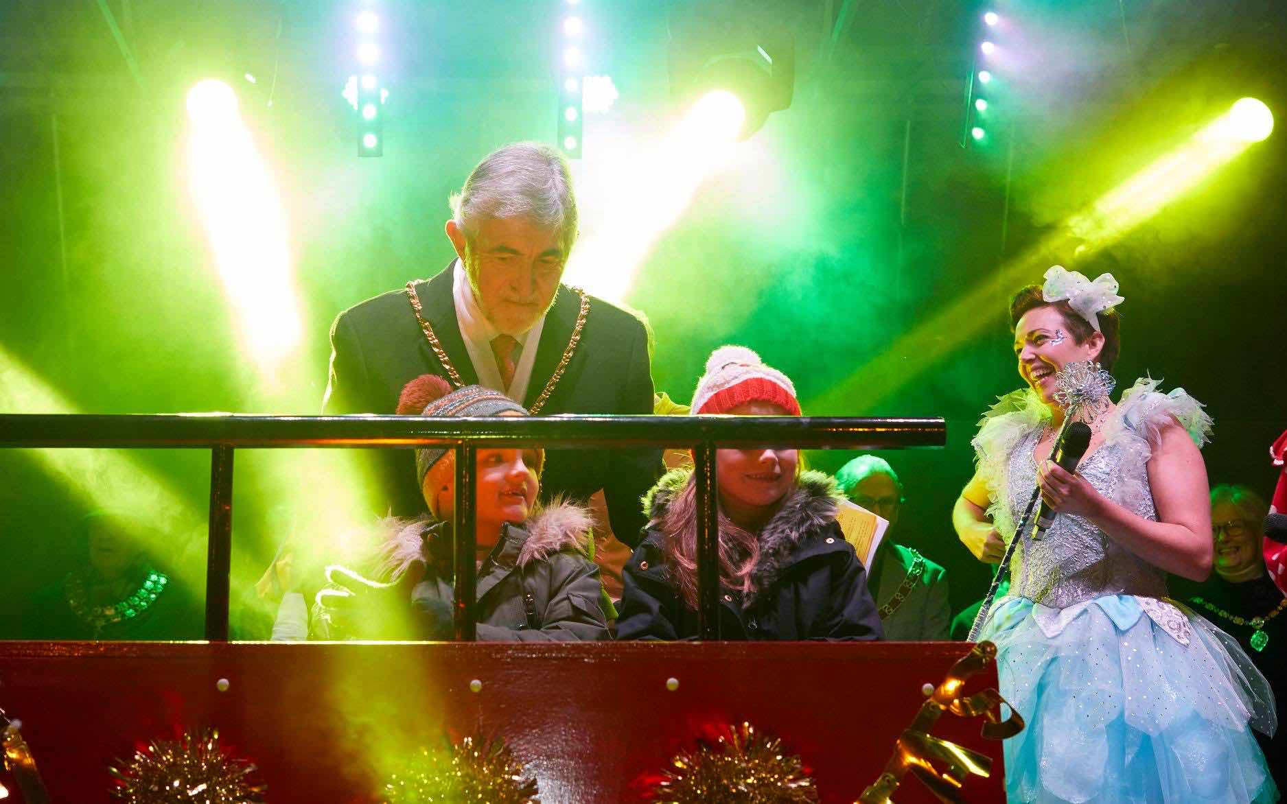 Lichfield , Staffordshire , Christmas , lights , switch on , 2018 , 2019 , gold , production , stage , hire , rent , rental , 