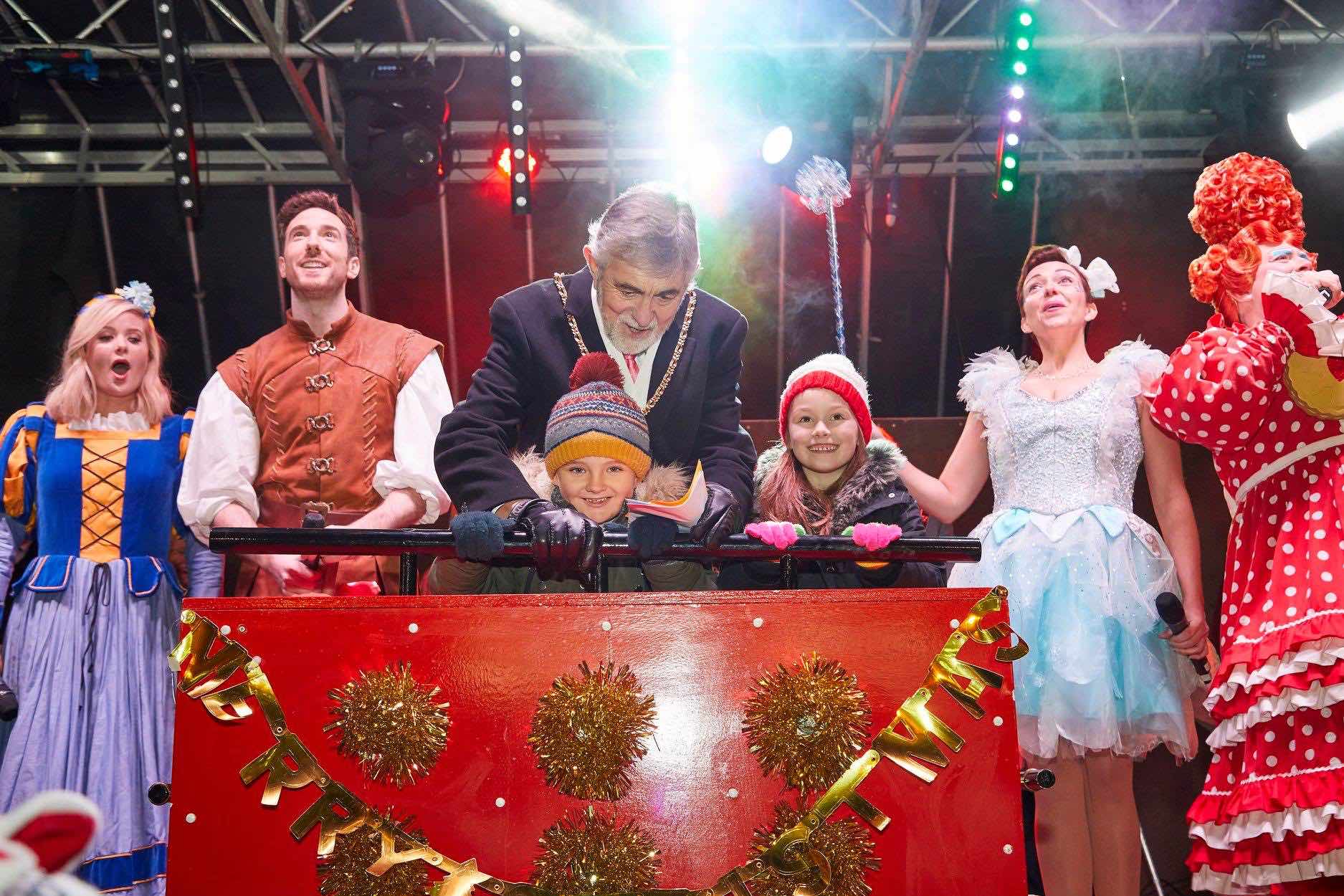 Lichfield , Staffordshire , Christmas , lights , switch on , 2018 , 2019 , gold , production , stage , hire , rent , rental , 